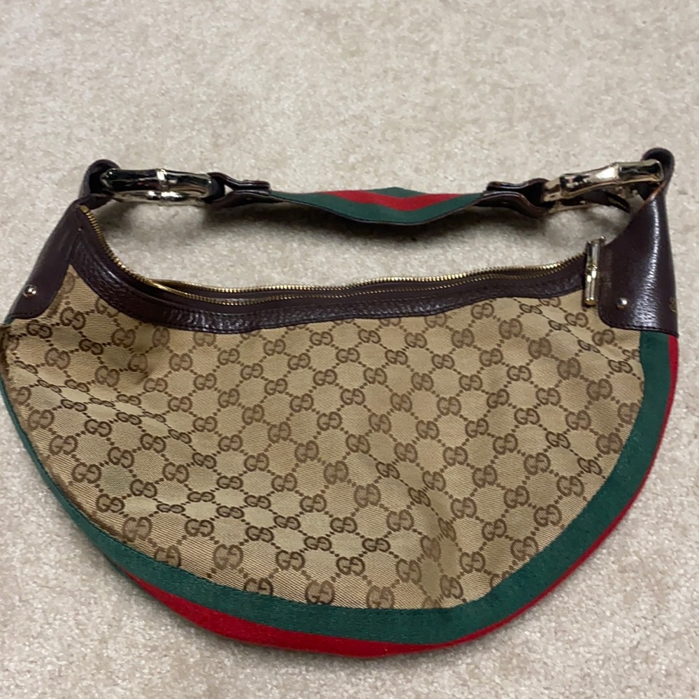 Gucci shoulder bag. See all photos. Excellent condition. Zippers work perfectly